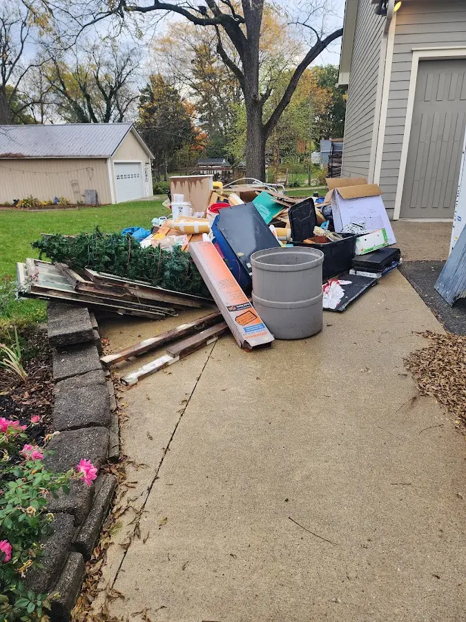Dumpster being loaded with debris for Demolition Dumpster Rental in Mount Repose